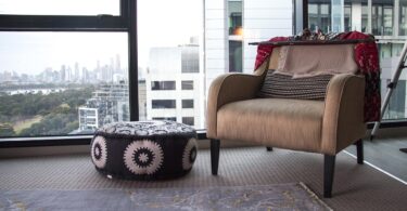 Modern living room with DIY decor and cozy home improvement elements from DecoratorAdvice.com