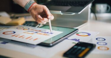 Modern dashboard displaying technology expense management analytics with charts and team collaboration