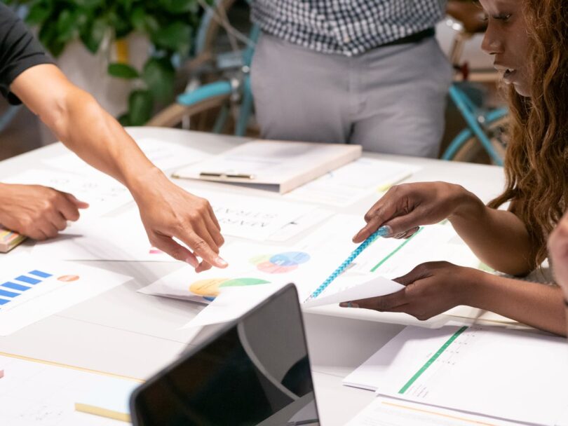 SEO experts analyzing growth metrics on a digital dashboard