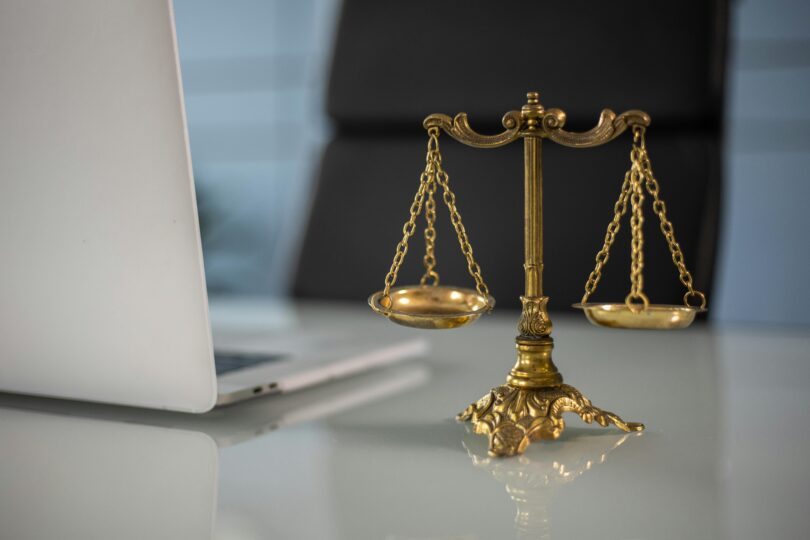 Business attorney near me discussing legal documents with a client